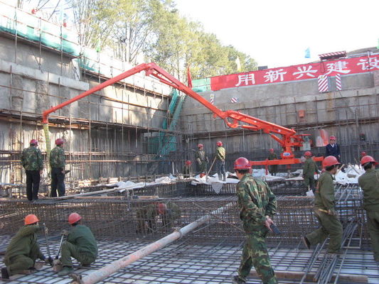 Bon prix R en forme de 18 m, porteuse manuelle pour la distribution du béton en ligne